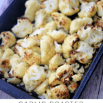cauliflower roasted in a pan with garlic