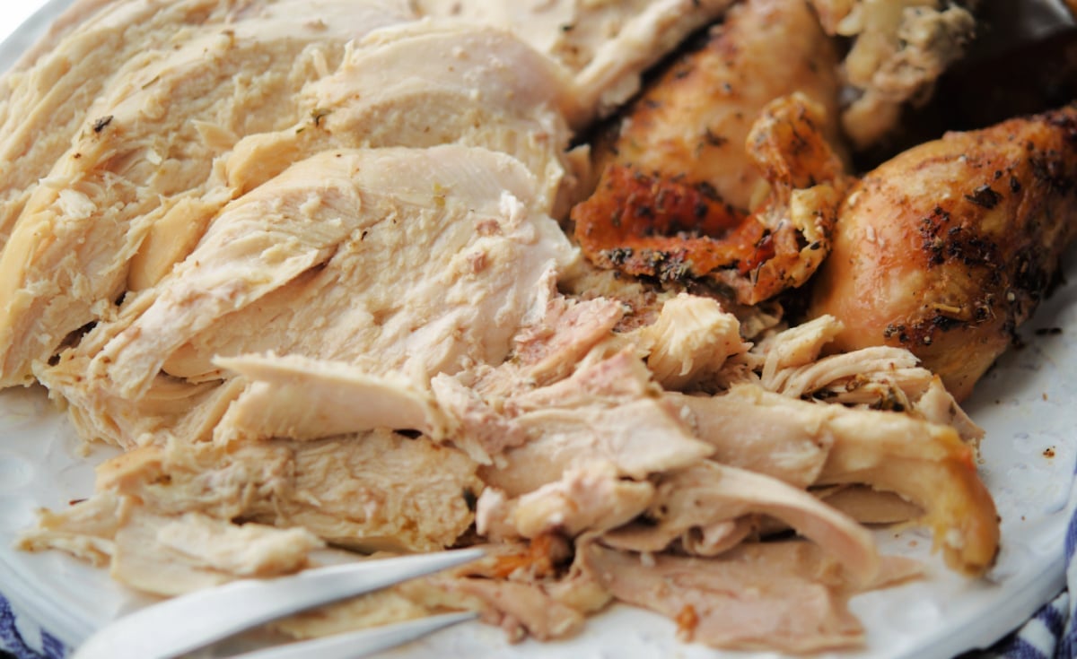 roasted chicken carved on a white plate