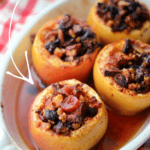 baked apples with cranberries in a dish