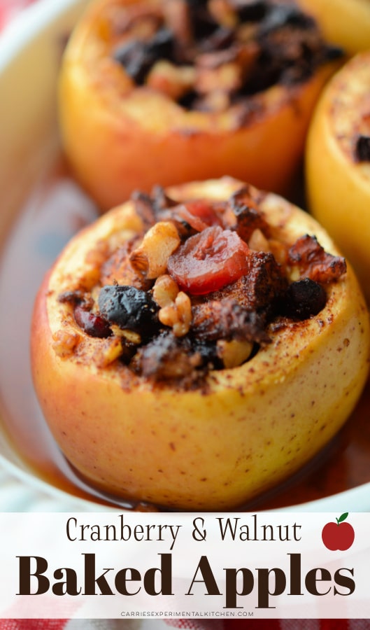 a close up of a cooked baked apple in a dish