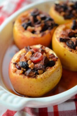 a close up of baked apples in a dish