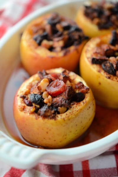 a close up of baked apples in a dish