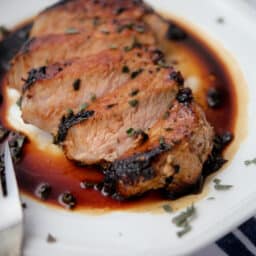 sliced honey maple pork chops on a plate