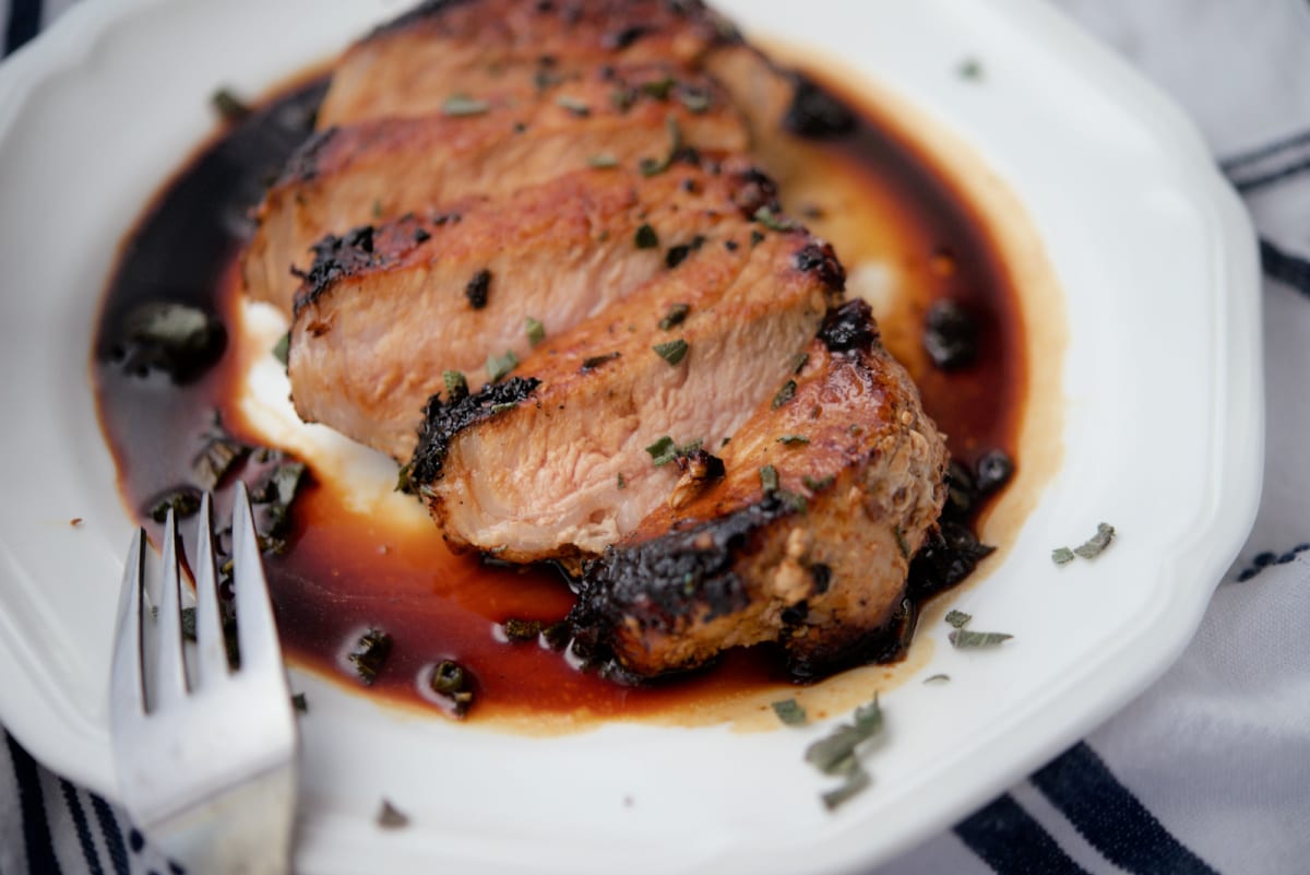 sliced honey maple pork chops on a plate