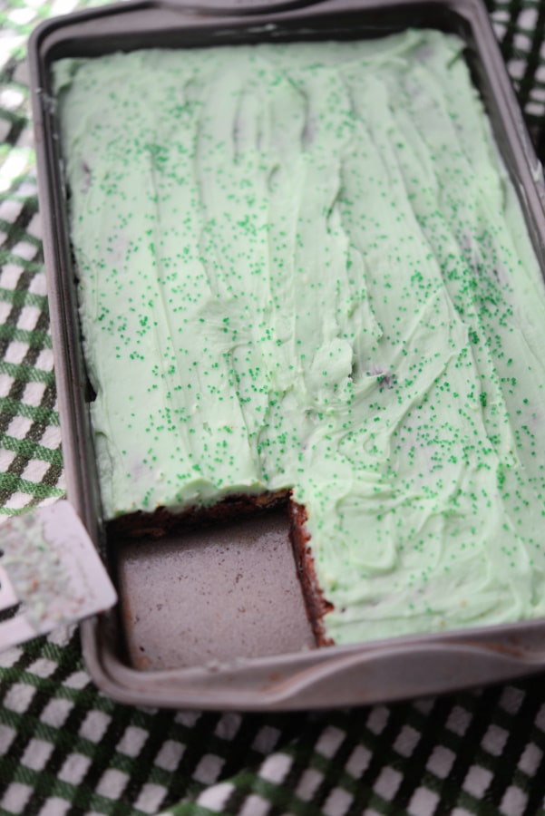 Irish cream brownies in a pan with one cut out