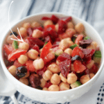 mediterranean chickpea salad with beets in a white bowl