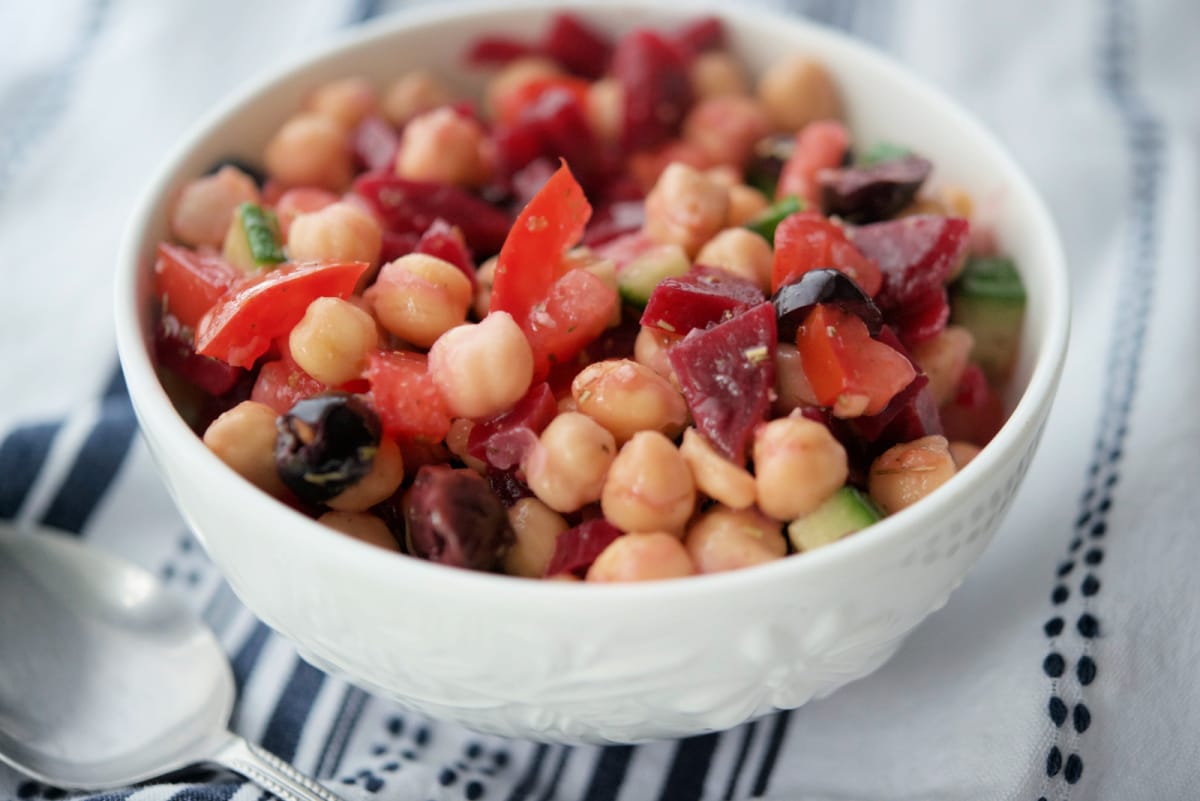 a bowl of chickpeas with beets