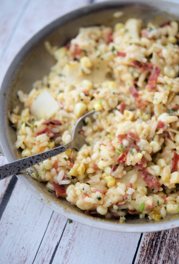 risotto with corn in a pan
