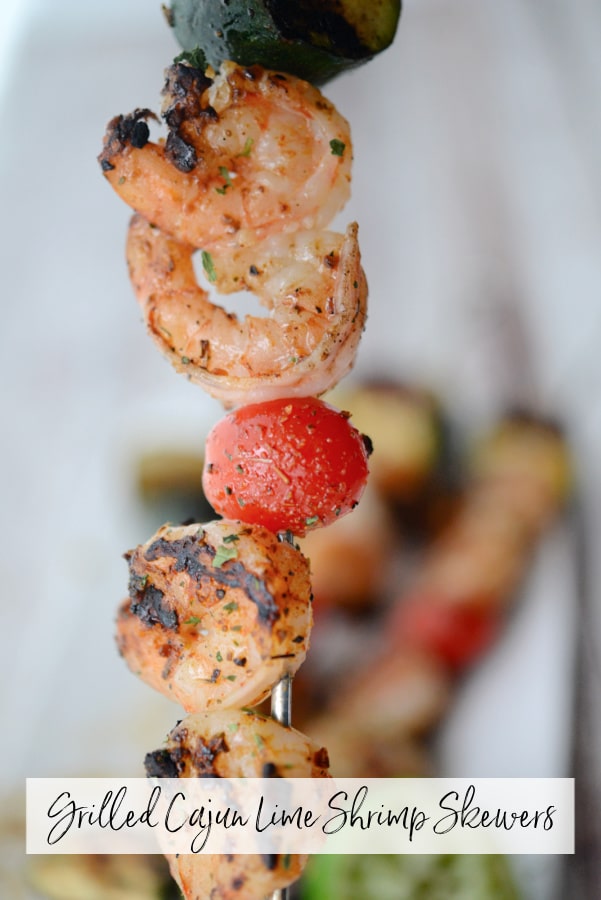 a close up of shrimp on skewer