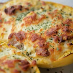 a close up of spaghetti squash in a dish