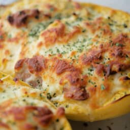 a close up of spaghetti squash in a dish