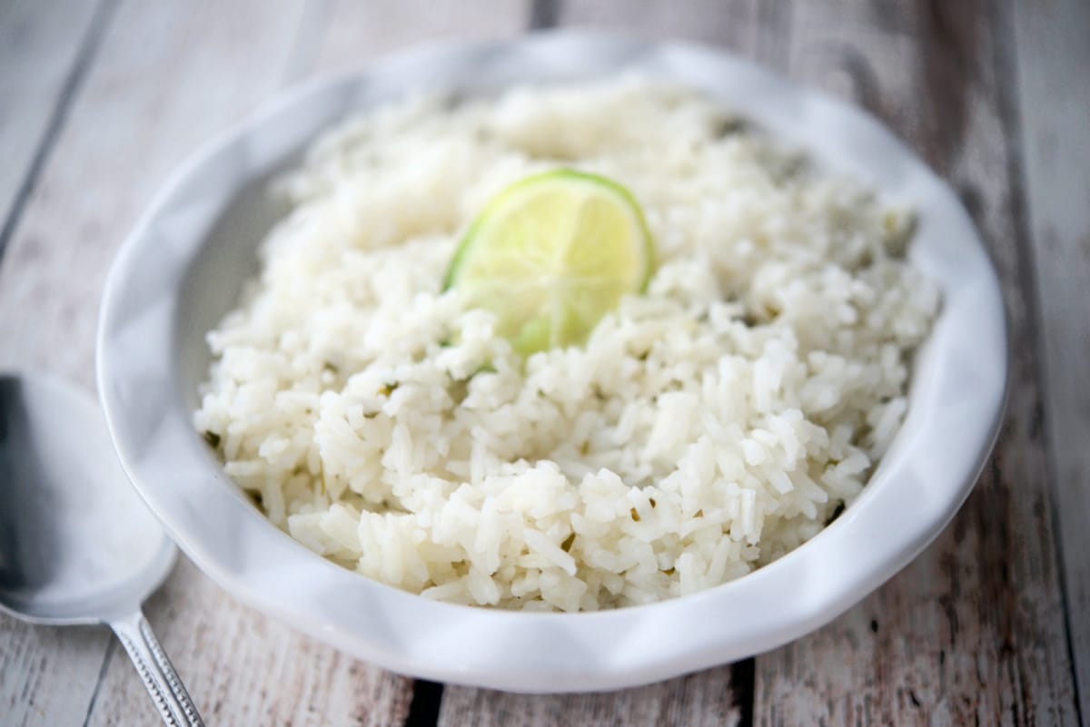 a close up of cilantro rice in a bowl