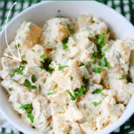 cajun potato salad in a white bowl