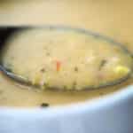 corn tomato chowder on a spoon