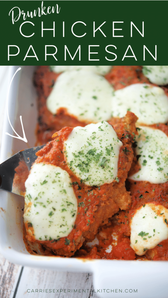 drunken chicken parmesan in a white baking dish