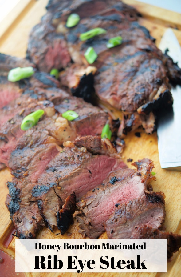 sliced steak on a cutting board