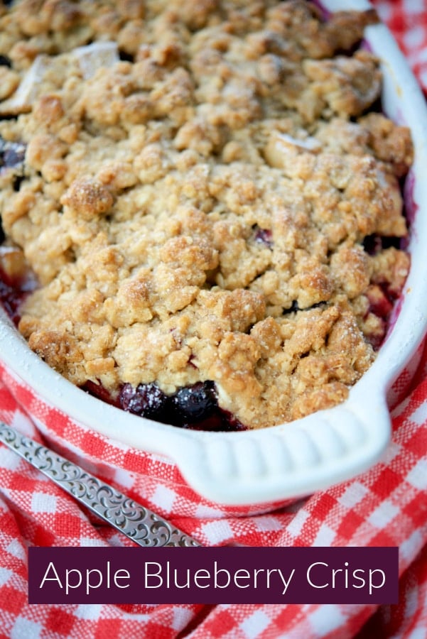 a casserole dish with apple and blueberry crisp