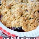 crisp made with apples and blueberries in a white baking dish