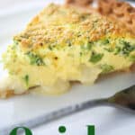 a slice of broccoli quiche on a white plate