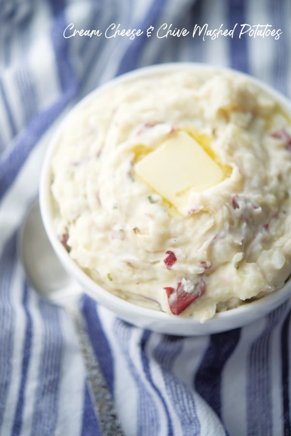 a bowl of mashed potatoes with butter. 