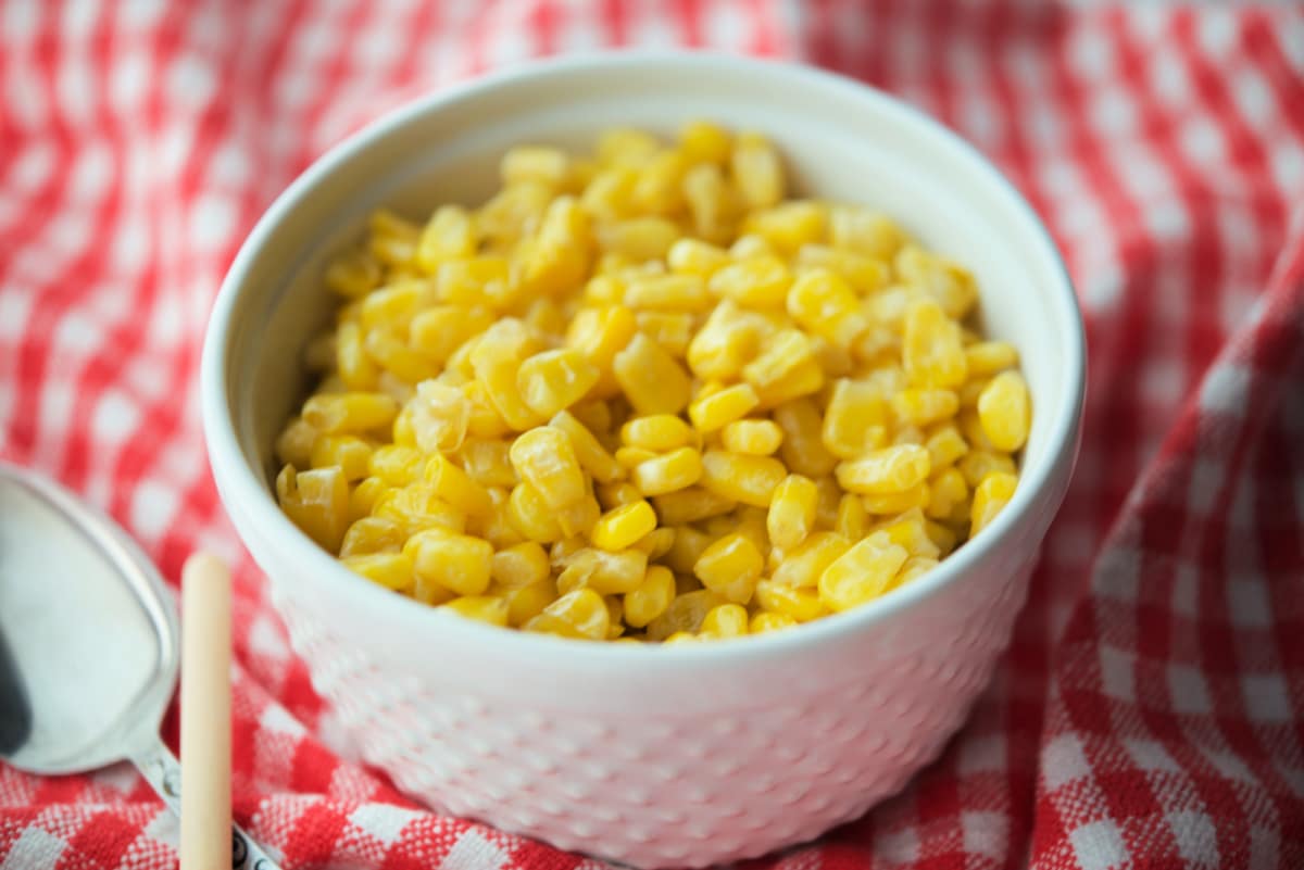 a close up of corn in a bowl