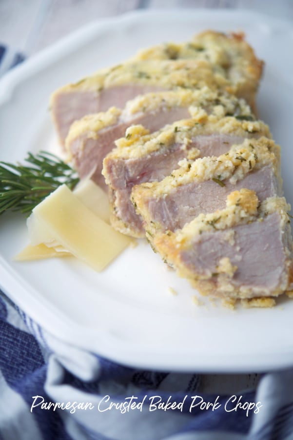 sliced pork chops on a white plate