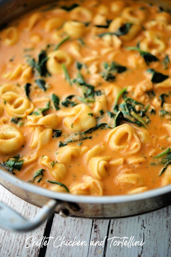 a pan of tortellini in a pink sauce