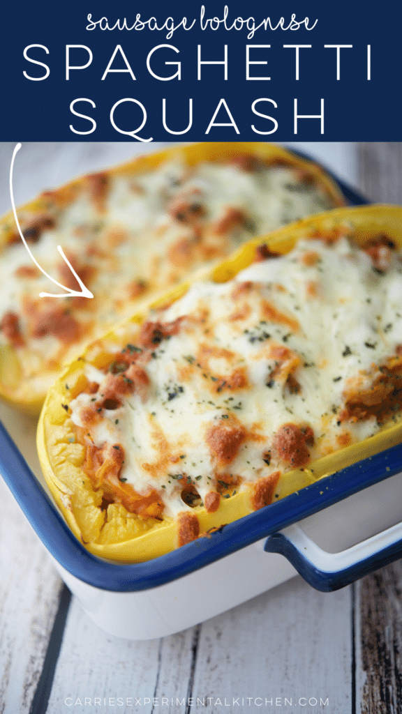 spaghetti squash in a blue and white dish stuffed with sausage bolognese