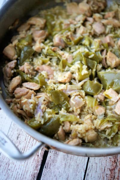 chicken peppers and onions in a skillet