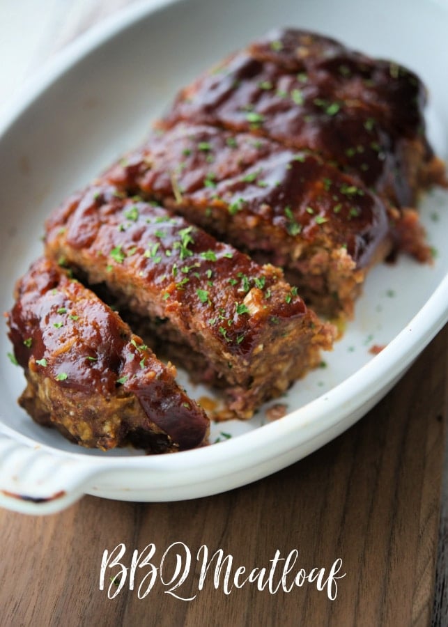 sliced meatloaf in a white dish