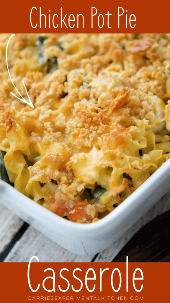 a close up of chicken pot pie casserole in white baking dish