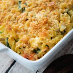 a close up of pot pie casserole in a white baking dish