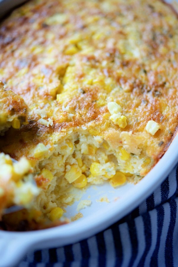 corn casserole baked in a white dish