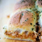 ground chicken parmesan slider on a wooden board