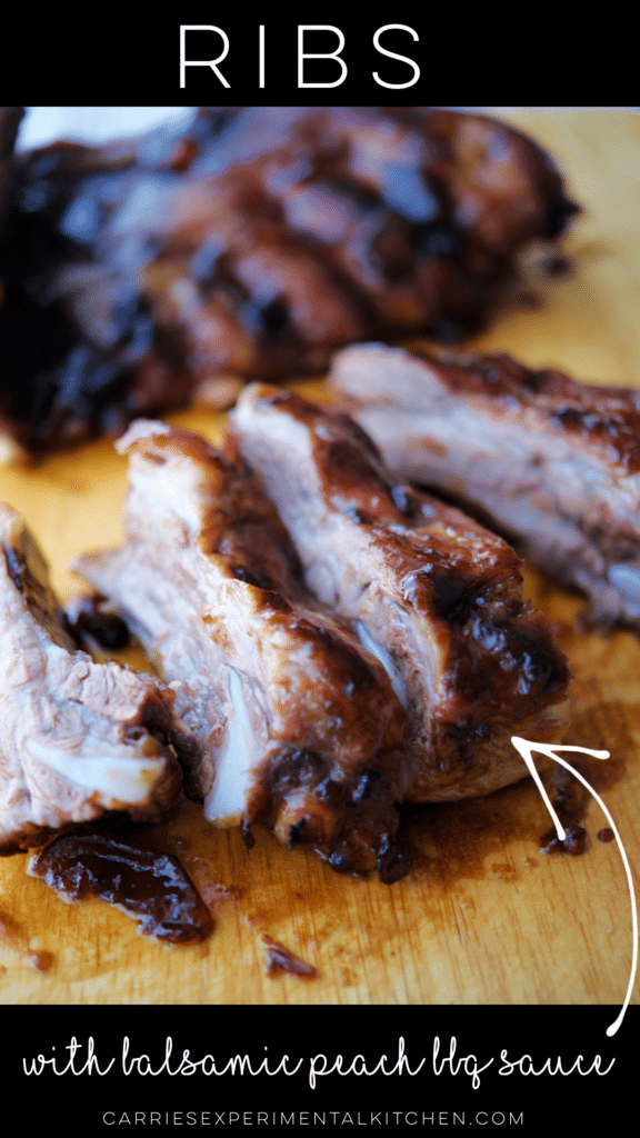 a close up of ribs cooked with balsamic peach bbq sauce