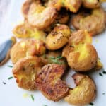 lemon baby potatoes on a white plate