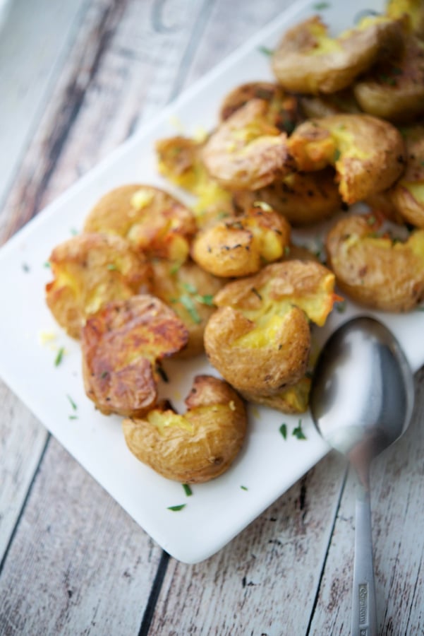 smashed potatoes on a plate