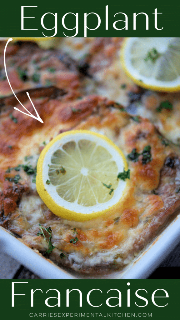 eggplant francaise with sliced lemons in a white dish