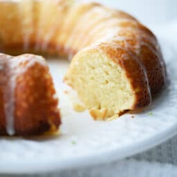 a close up of a piece of lime bundt cake