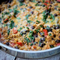 a close up of mexican style chicken and rice