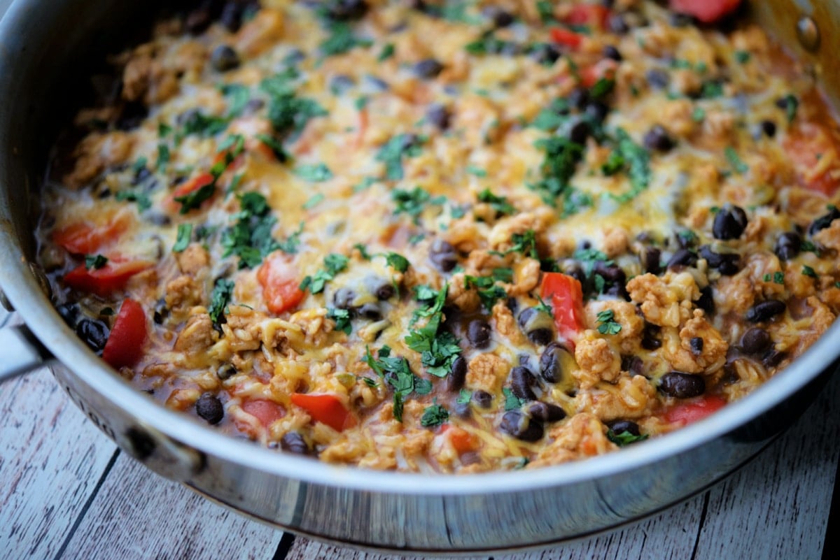 a close up of mexican style chicken and rice