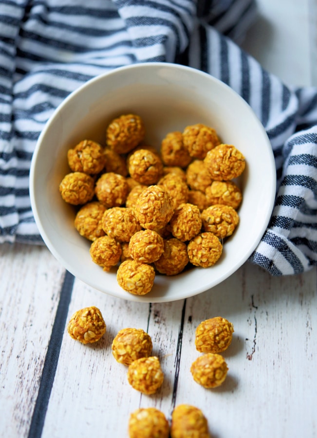 pumpkin oat dog treats in a white bowl