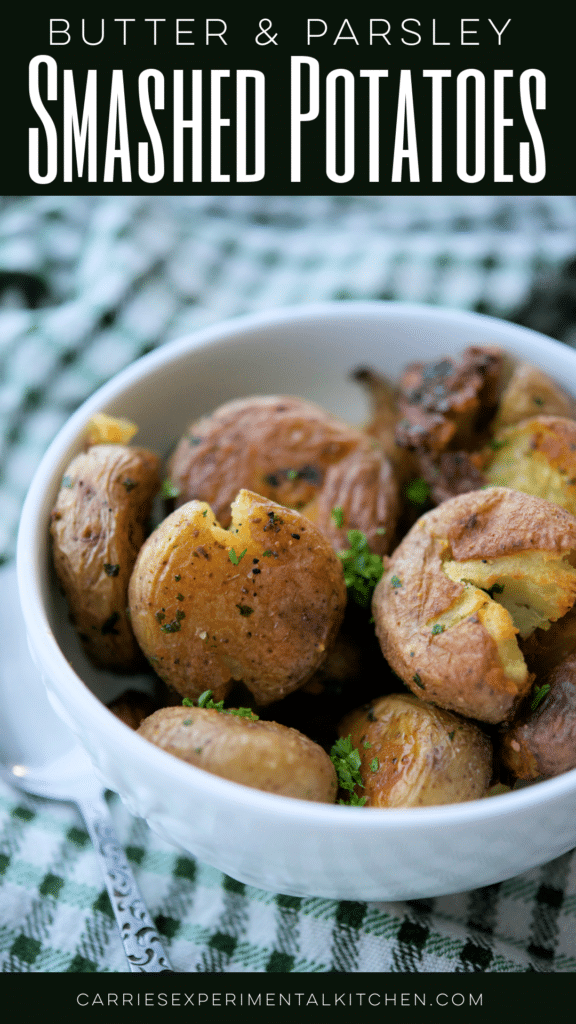 a bowl of butter and parsley smashed potatoes