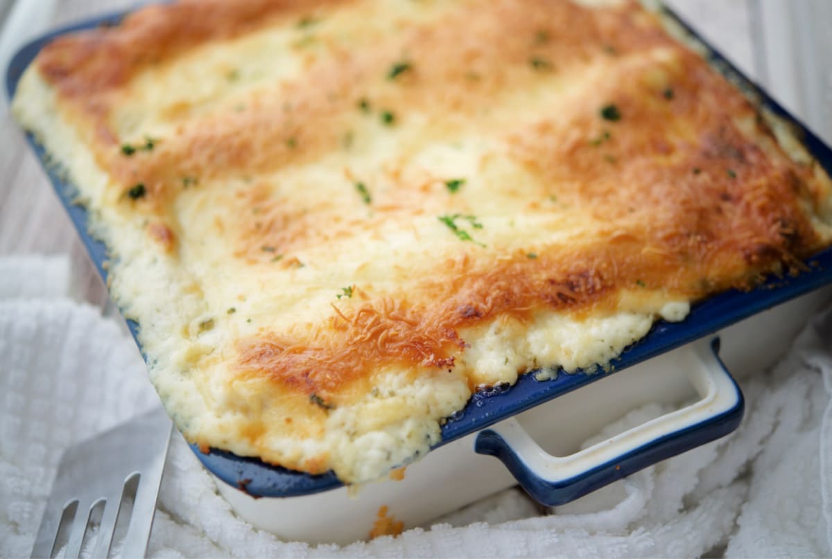 lasagna with butternut squash in a square baking dish