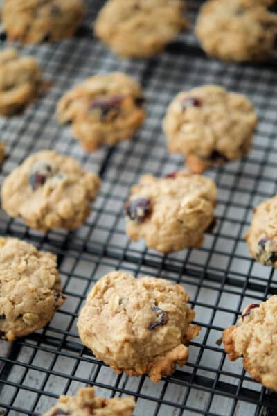 cranberry oatmeal cookies on a cooling rack