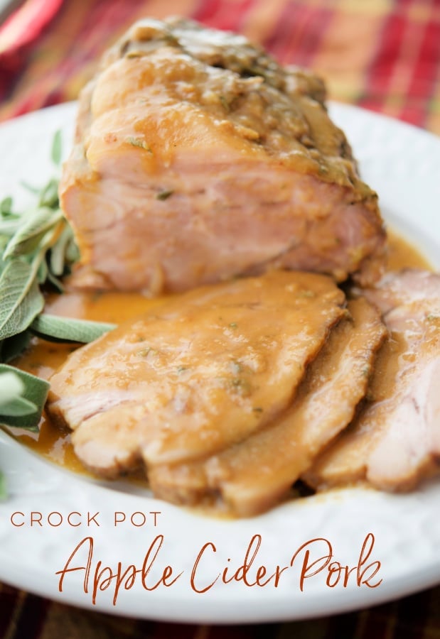 pork sliced on a plate with apple cider sauce