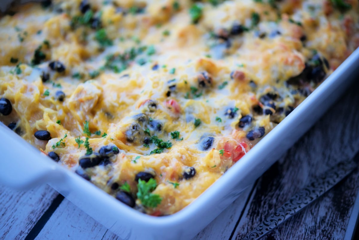 a close up of pico de gallo squash in a white casserole dish