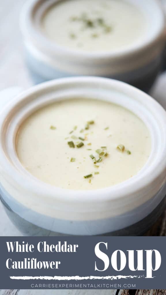 white cheddar cauliflower soup in a soup crock