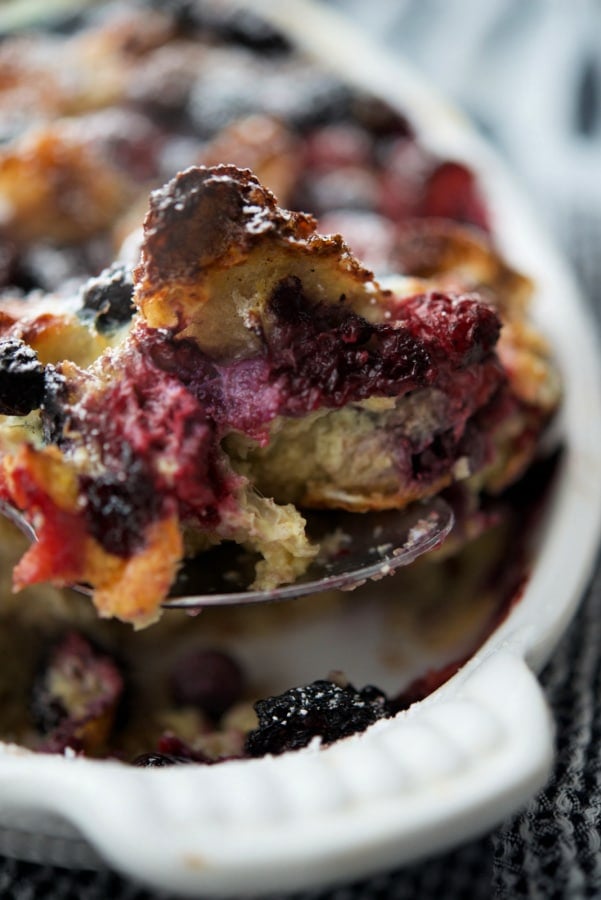a close up of berry french toast casserole on a spooon