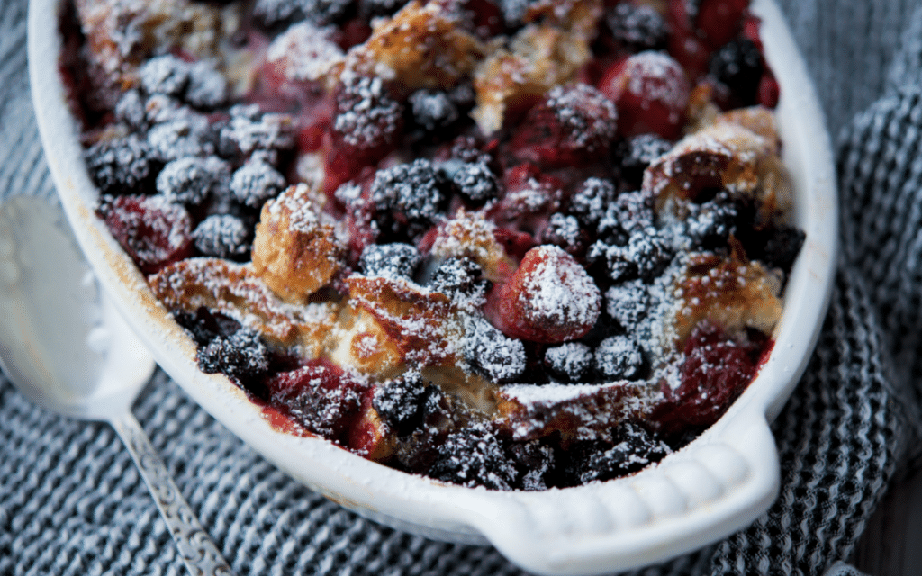 berry french toast casserole in a white dish